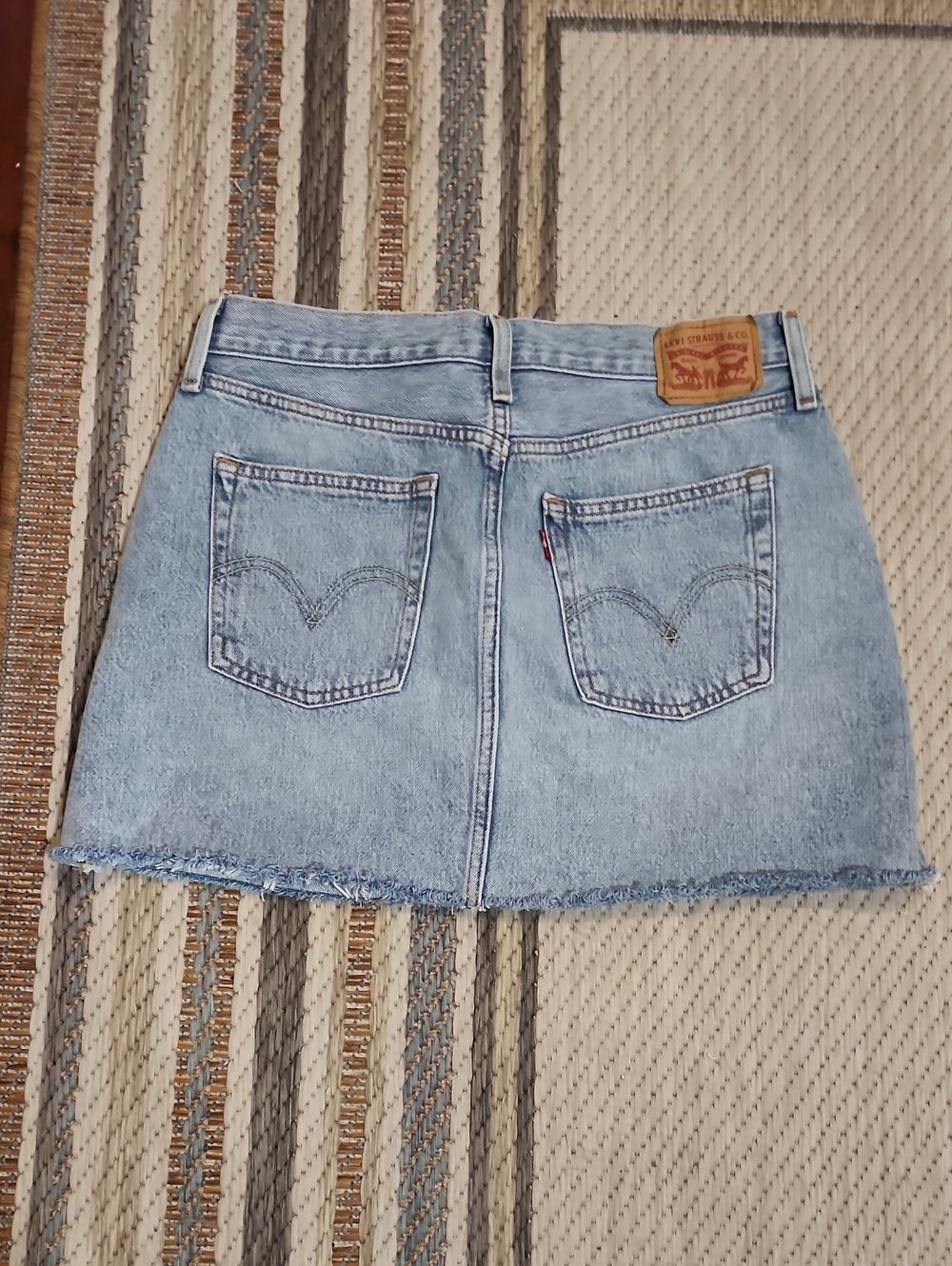 Levi's Light Wash Denim Mini Skirt with Frayed Hem
